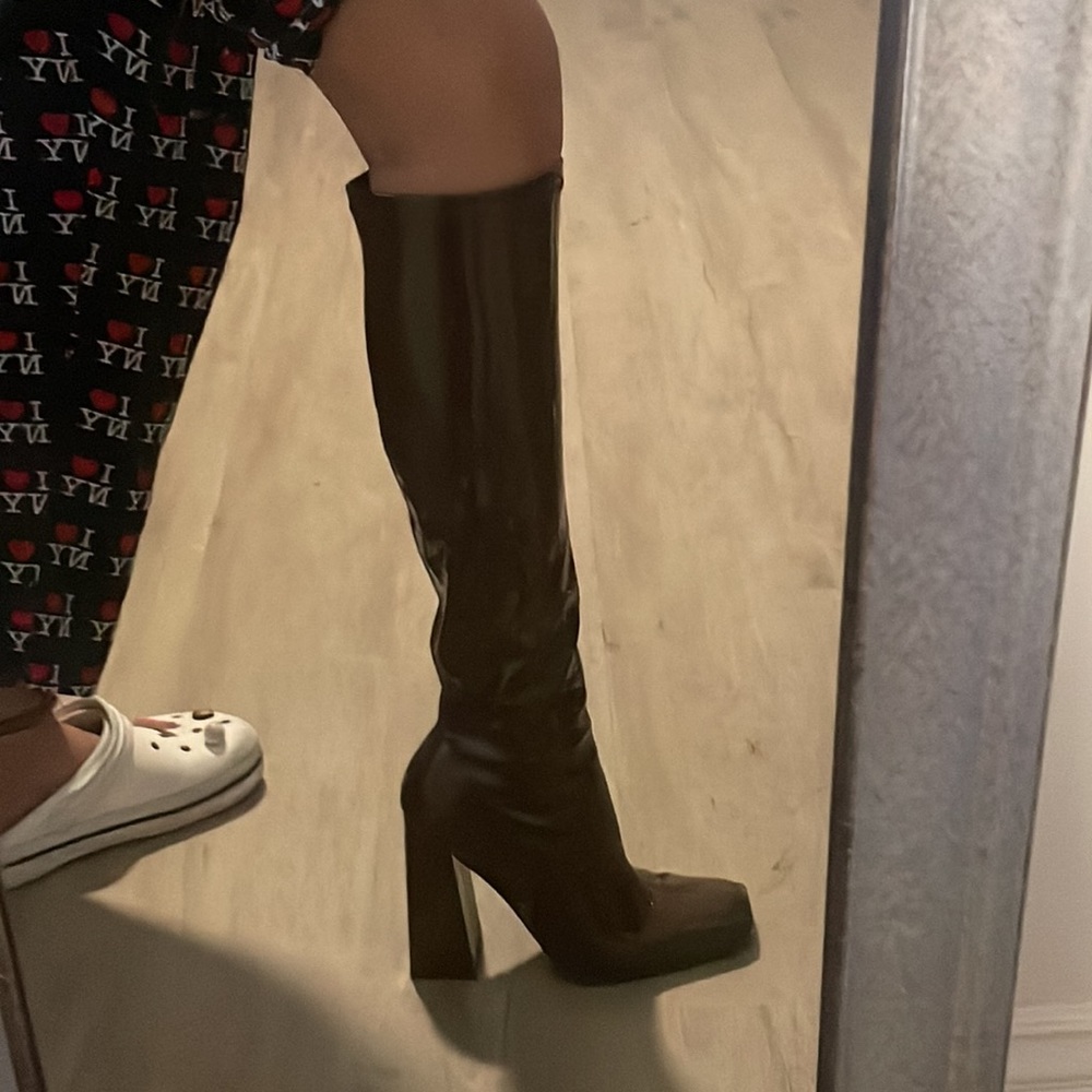 Brown knee high heel boots